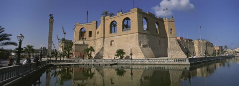 Framed Reflection of a building in a pond, Assai Al-Hamra, Tripoli, Libya Print