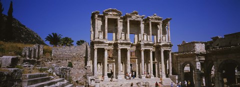 Framed Tourists in front of the old ruins of a library, Library At Epheses, Ephesus, Turkey Print