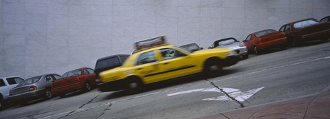 Framed Taxi running on the road, San Francisco, California, USA Print
