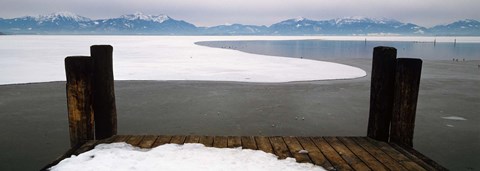 Framed Frozen lake in front of snowcapped mountains, Chiemsee, Bavaria, Germany Print