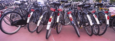 Framed Bicycles parked in a parking lot, Amsterdam, Netherlands Print