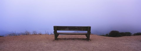 Framed Empty bench in a parking lot, California, USA Print