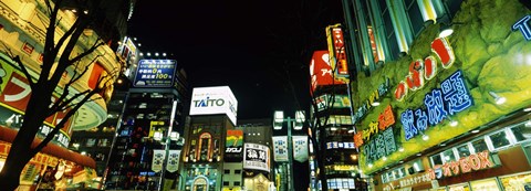 Framed Low angle view of buildings lit up at night, Shinjuku Ward, Tokyo Prefecture, Kanto Region, Japan Print
