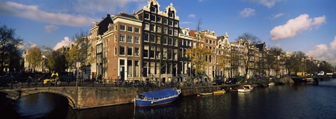 Framed Boats and Buildings along a canal, Amsterdam, Netherlands Print