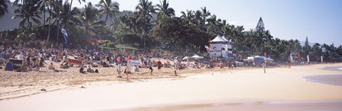 Framed Tourists on the beach, North Shore, Oahu, Hawaii, USA Print