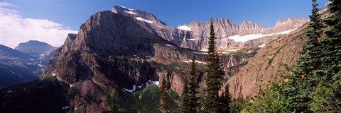 Framed Trees with a mountain range in the background, US Glacier National Park, Montana, USA Print