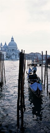 Framed Gondolier in a gondola with a cathedral in the background, Santa Maria Della Salute, Venice, Veneto, Italy Print