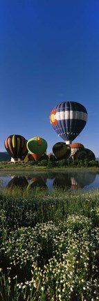 Framed Reflection of hot air balloons in a lake, Hot Air Balloon Rodeo, Steamboat Springs, Colorado, USA Print