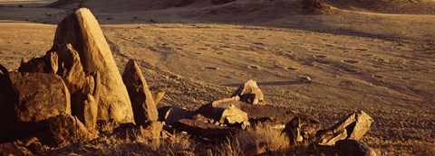Framed Rocks in a desert, overview of tourist vehicle, Namibia Print