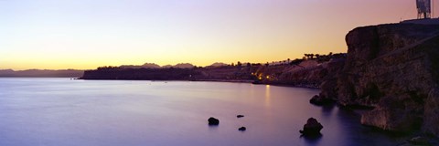 Framed Coastal city at dusk, Ras Um Sid, Sharm al-Sheikh, Sinai Peninsula, Egypt Print