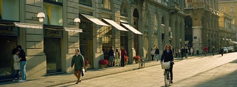 Framed Cyclists and pedestrians on a street, City Center, Florence, Tuscany, Italy Print