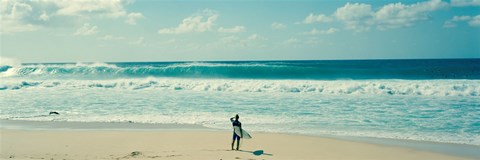 Framed Surfer standing on the beach, North Shore, Oahu, Hawaii Print