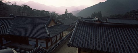 Framed Buddhist temple with mountain range in the background, Kayasan Mountains, Haeinsa Temple, Gyeongsang Province, South Korea Print