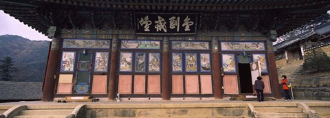 Framed Buddhist temple with a mountain range in the background, Kayasan Mountains, Haeinsa Temple, Gyeongsang Province, South Korea Print
