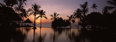 Framed Sunset over hotel pool, Lombok, West Nusa Tenggara, Indonesia Print