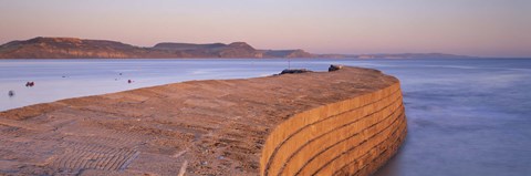 Framed Harbour wall at dusk, The Cobb, Lyme Regis, Dorset, England Print