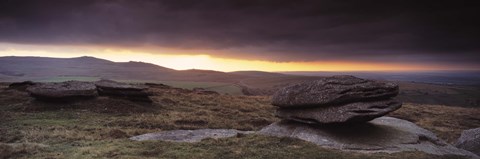 Framed Bright horizon with dark clouds from Higher Tor, Dartmoor, Devon, England Print