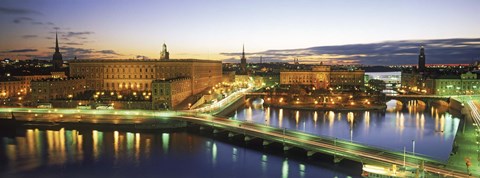 Framed Royal Palace and Parliament building lit up at dusk, Stockholm, Sweden Print