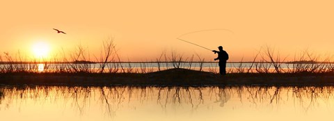 Framed Silhouette of a man fishing Print