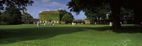 Framed Cricket match on the green at Crakehall, Bedale, North Yorkshire, England Print