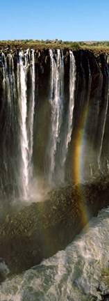 Framed Rainbow forms in the water spray in the gorge at Victoria Falls, Zimbabwe Print