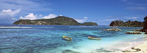 Framed Small fishing boats on Anse L'Islette with Therese Island in background, Seychelles Print