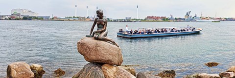 Framed Little Mermaid Statue with tourboat in a canal, Copenhagen, Denmark Print