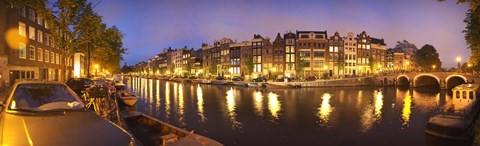 Framed Night view along canal, Amsterdam, Netherlands Print