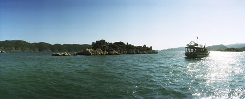 Framed Rocky island and boat in the Mediterranean sea, Sunken City, Kekova, Antalya Province, Turkey Print