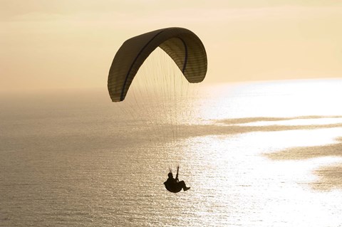 Framed Silhouette of a paraglider flying over an ocean, Pacific Ocean, San Diego, California, USA Print