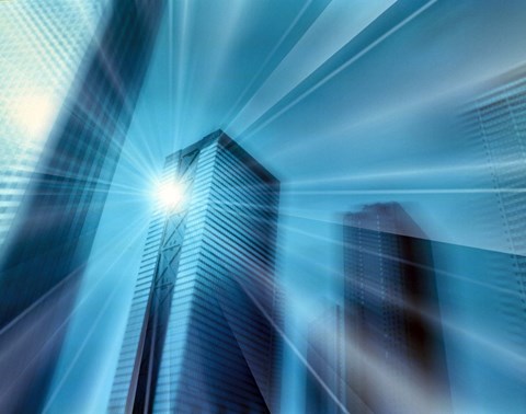 Framed Bright ball of light radiating rays of light in front of out of focus sky scrapers Print