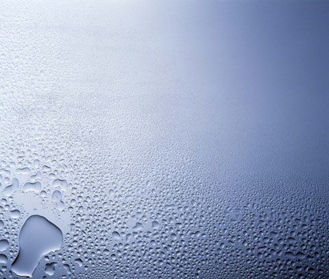 Framed Water drops on clear glass with purple background Print