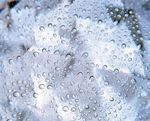 Framed Kaleidoscopic pattern in purple, lavender and white with water droplets Print