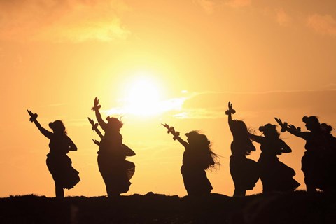 Framed Silhouette of hula dancers at sunrise, Molokai, Hawaii, USA Print