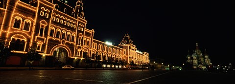 Framed Facade of a building lit up at night, GUM, Red Square, Moscow, Russia Print