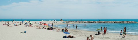 Framed Tourists on the beach, Saintes-Maries-De-La-Mer, Bouches-Du-Rhone, Provence-Alpes-Cote d&#39;Azur, France Print