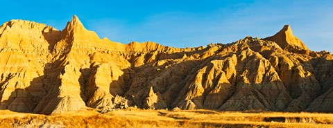 Framed Sculpted sandstone spires on a landscape, Saddle Pass Trail, Badlands National Park, South Dakota, USA Print