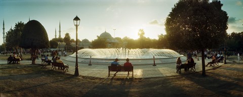 Framed People sitting at a fountain with Blue Mosque in the background, Istanbul, Turkey Print