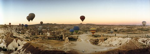 Framed Hot air balloons traversing Cappadocia, Central Anatolia Region, Turkey Print