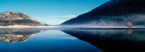 Framed Reflection of a mountain with snowy trees on a lake in winter afternoon, Cote d&#39;Azur, France Print