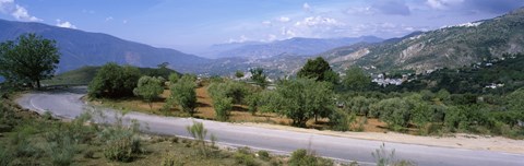 Framed Road passing through a landscape with mountains in the background, Andalucian Sierra Nevada, Andalusia, Spain Print