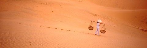 Framed Woman carrying panniers, Mui Ne, Vietnam Print