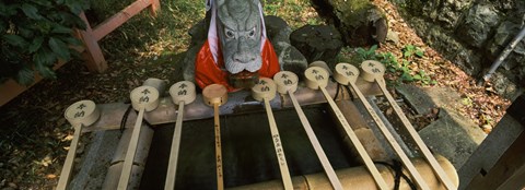 Framed Water ladles in a shrine, Fushimi Inari-Taisha, Fushimi Ward, Kyoto, Kyoto Prefecture, Kinki Region, Honshu, Japan Print