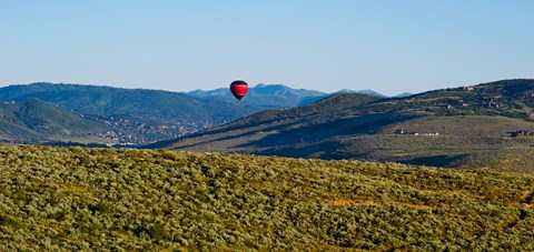 Framed Hot air balloon flying in a valley, Park City, Utah, USA Print