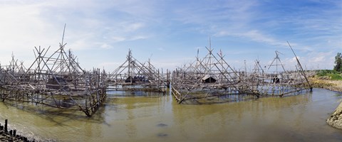 Framed Fishing platforms along coast of Madura Island, Indonesia Print