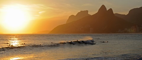 Framed Surfers at sunset on Ipanema Beach, Rio De Janeiro, Brazil Print