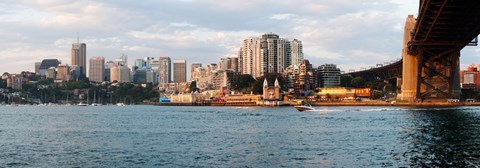 Framed Skyscrapers at the waterfront, McMahons Point, Sydney Harbor Bridge, Sydney Harbor, Sydney, New South Wales, Australia 2012 Print