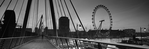 Framed Bridge across a river with a ferris wheel, Golden Jubilee Bridge, Thames River, Millennium Wheel, London, England Print