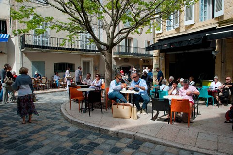 Framed Tourists at sidewalk cafes, Lourmarin, Vaucluse, Provence-Alpes-Cote d&#39;Azur, France Print