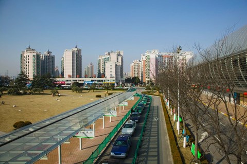 Framed Taxis parked outside a maglev train station, Pudong, Shanghai, China Print